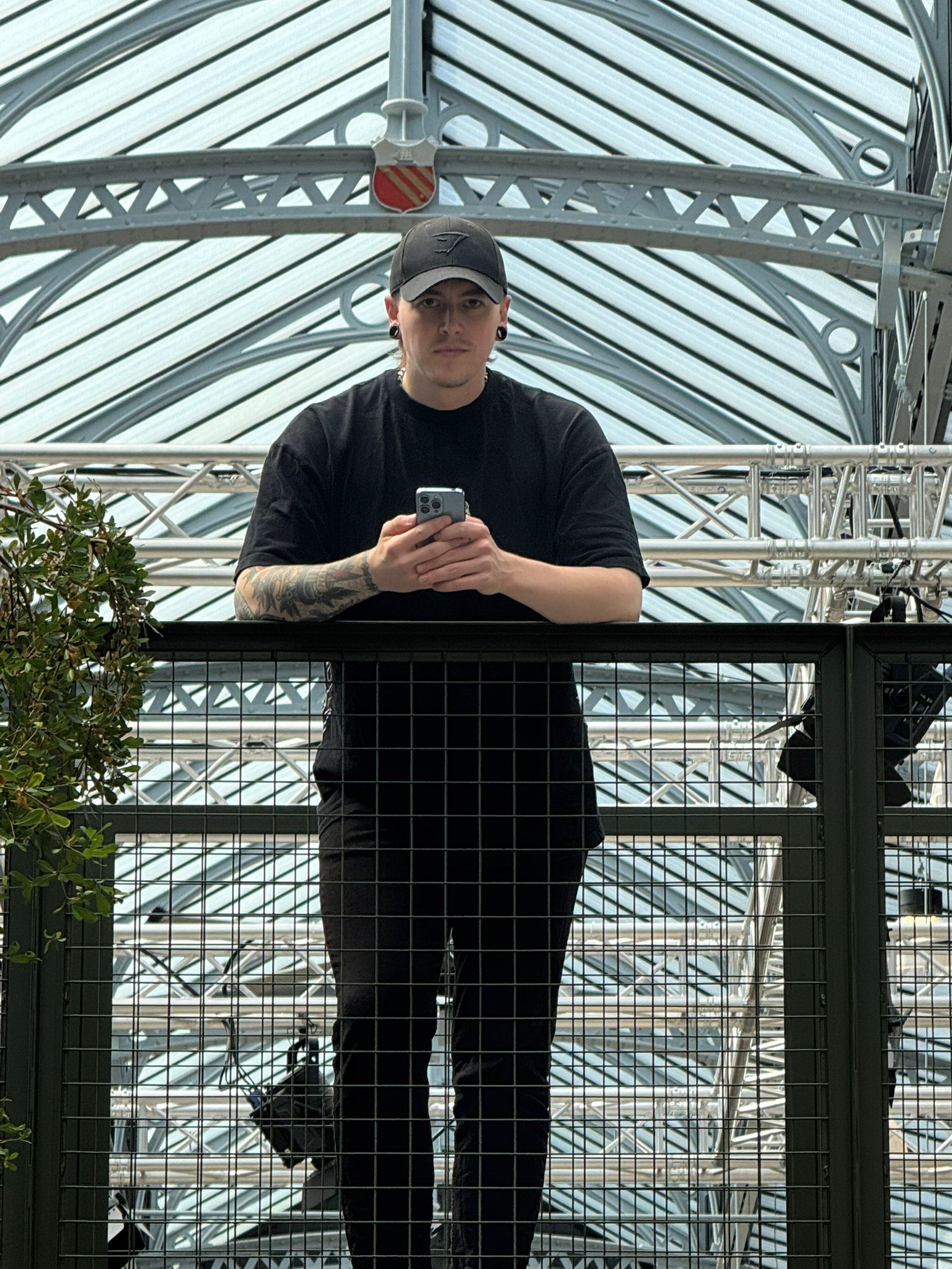 Sam poses for a photo whilst working for Deviation in Campfield Manchester.