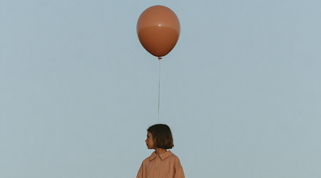 A girl with a balloon