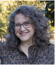 Rachel Benoff smiling headshot with glasses