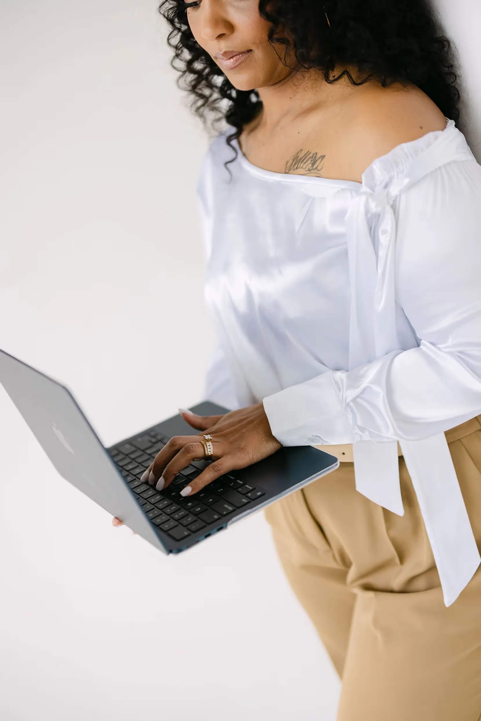 Administrative expert managing business tasks on a laptop