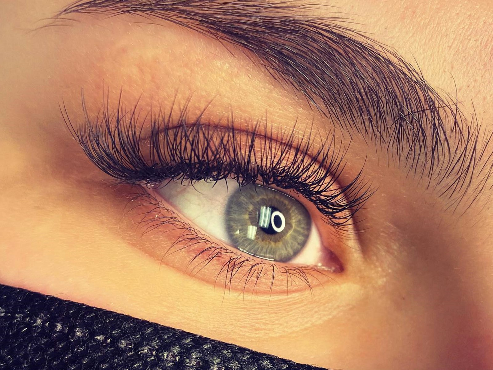 Close-up of an eye with long lashes