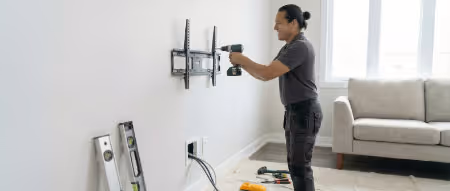 Professional TV wall mounting and wire hiding in Calgary. | Quickfix Handyman Inc.