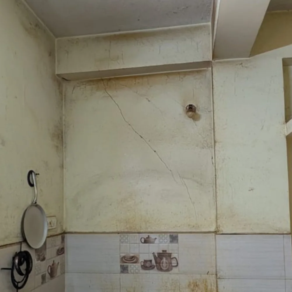 Diagonal settlement crack on interior wall — foundation distress on clay soil, Chennai residential building