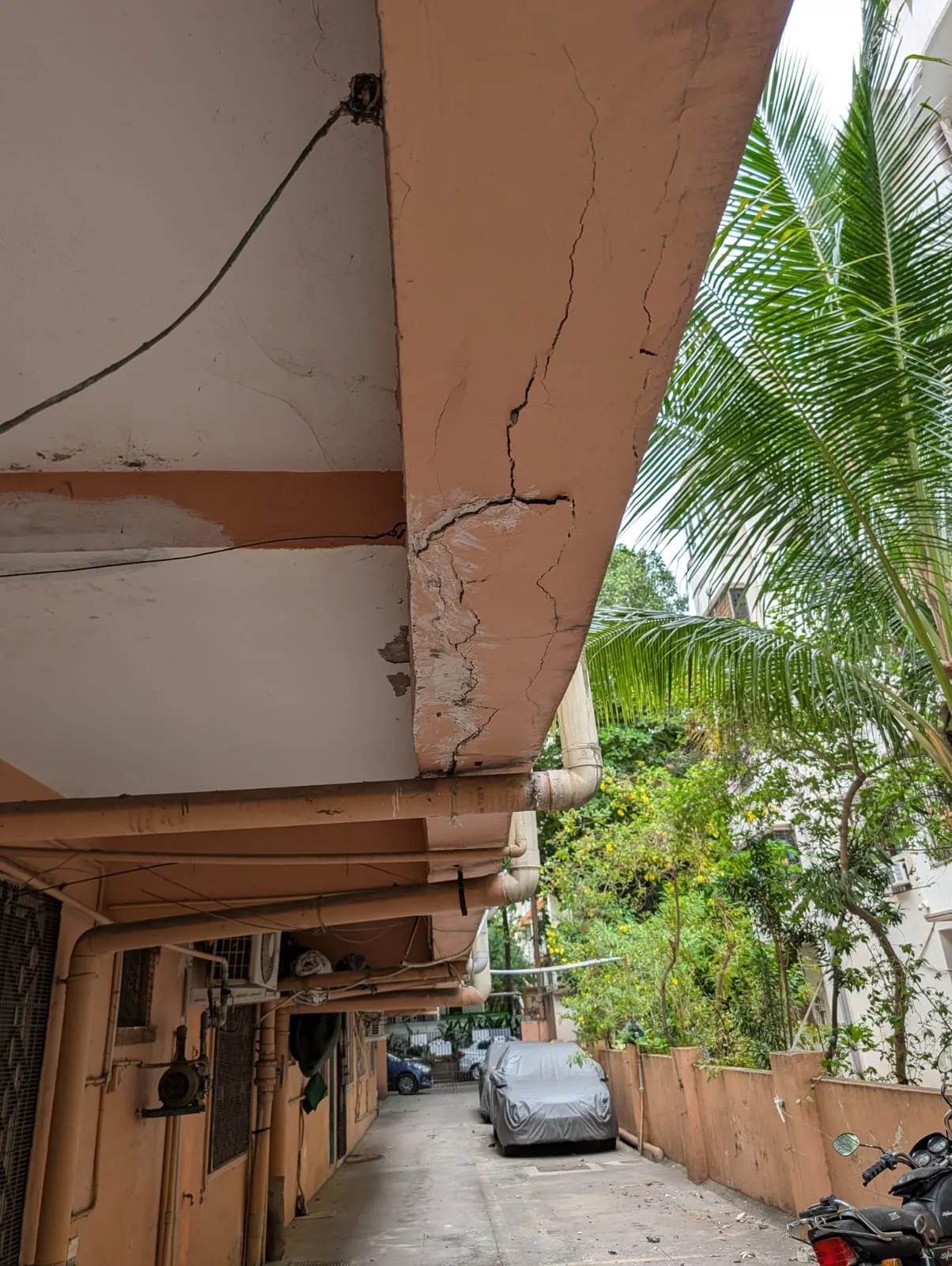 Hollow sounding cracked concrete beam — residential apartment structural repair Chennai
