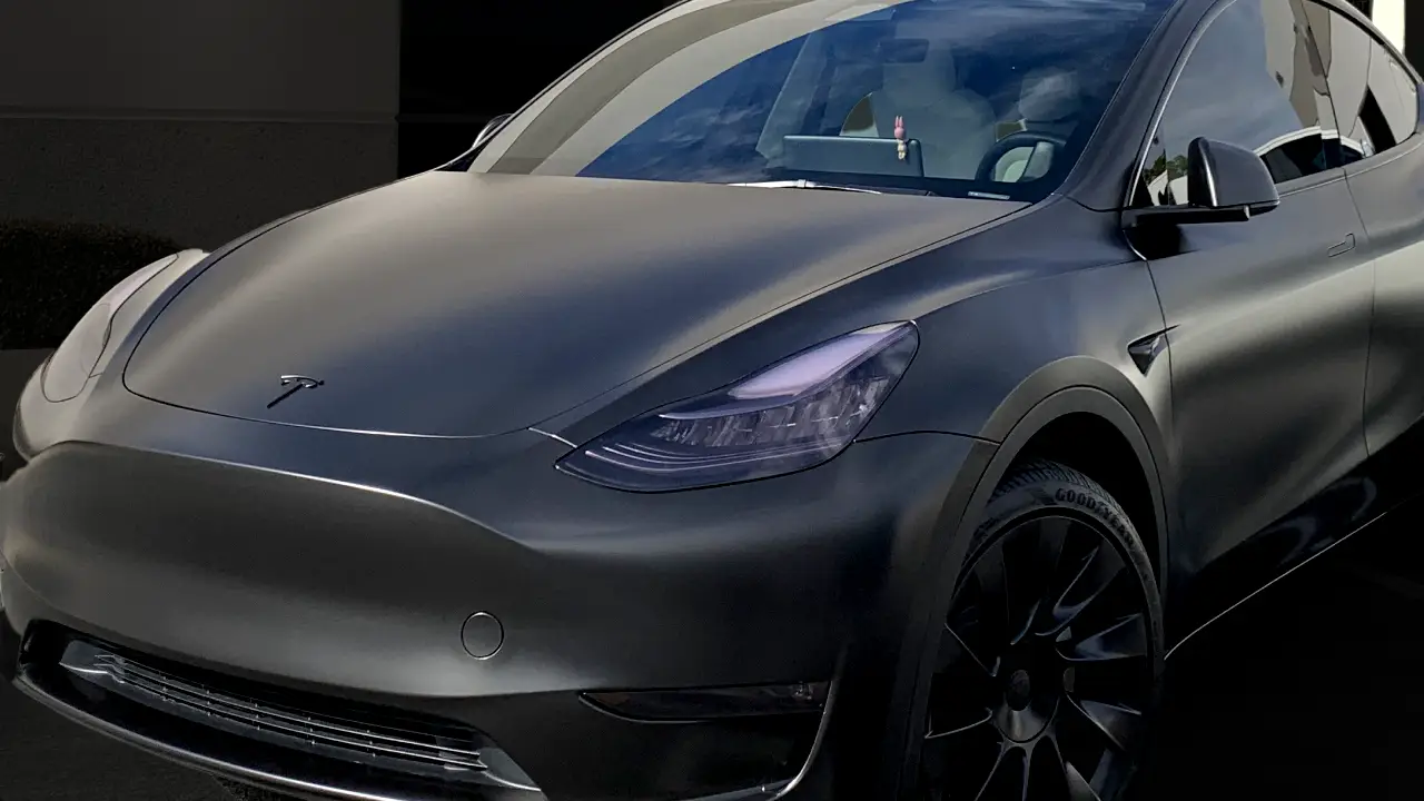 A gray car with smoked lights.