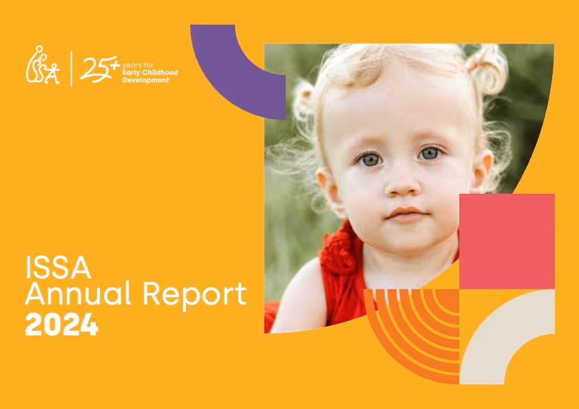 Cover of ISSA Annual Report 2024 featuring a toddler with blonde hair in a red outfit against an orange background with decorative shapes.