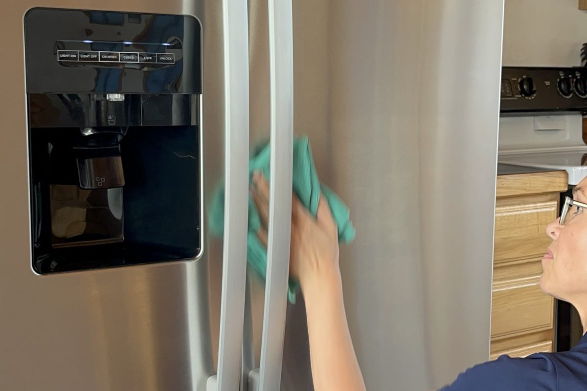 Polishing a stainless steel refrigerator