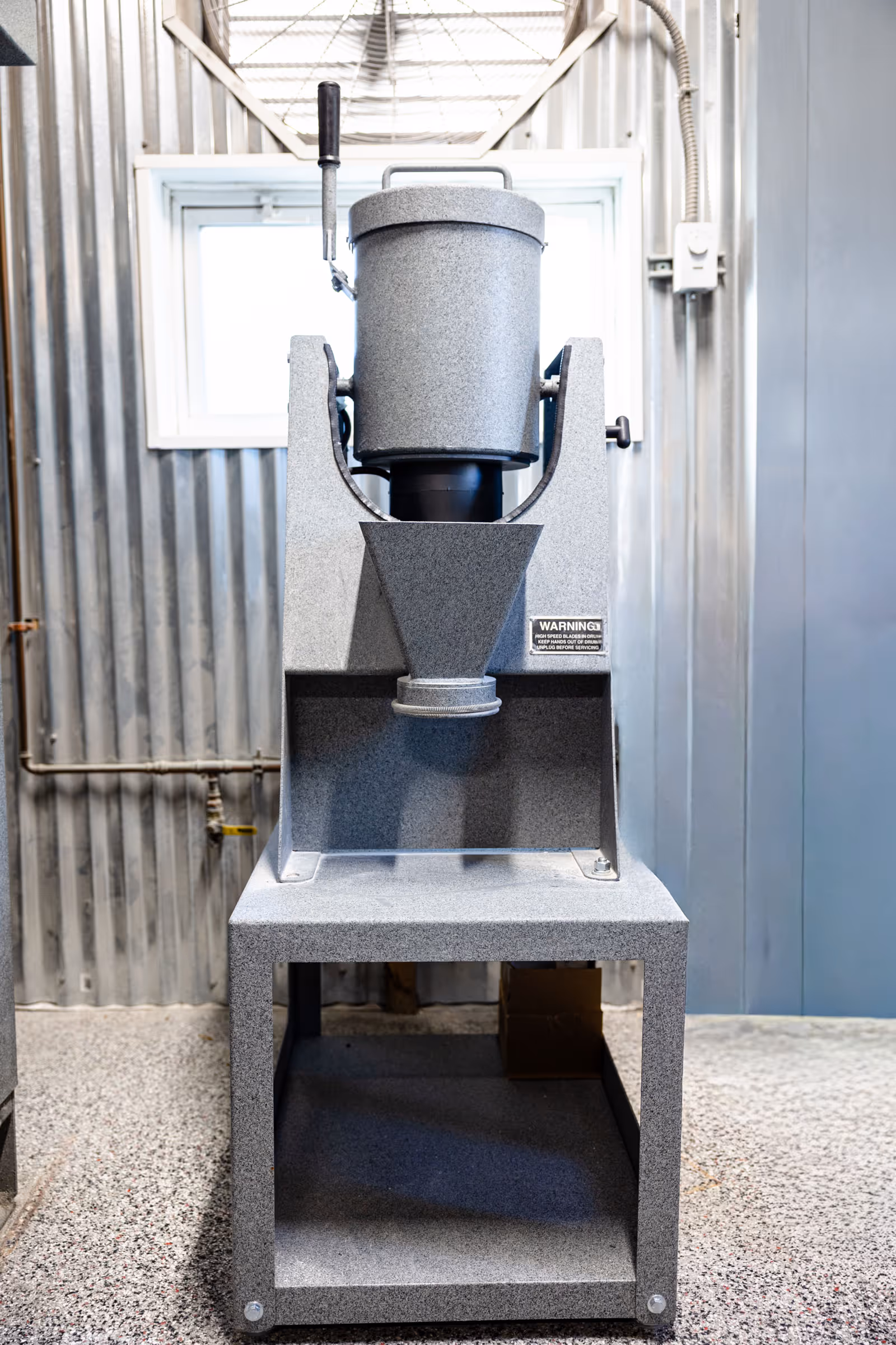 Specialized equipment used inside an animal crematory, shown in a clean and controlled environment.