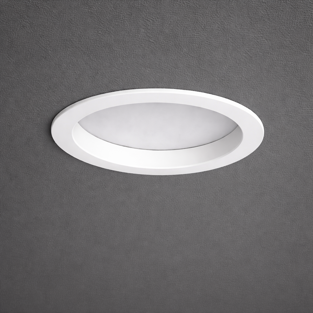 Recessed ceiling luminaires delivering clean, focused illumination with a discreet architectural appearance.