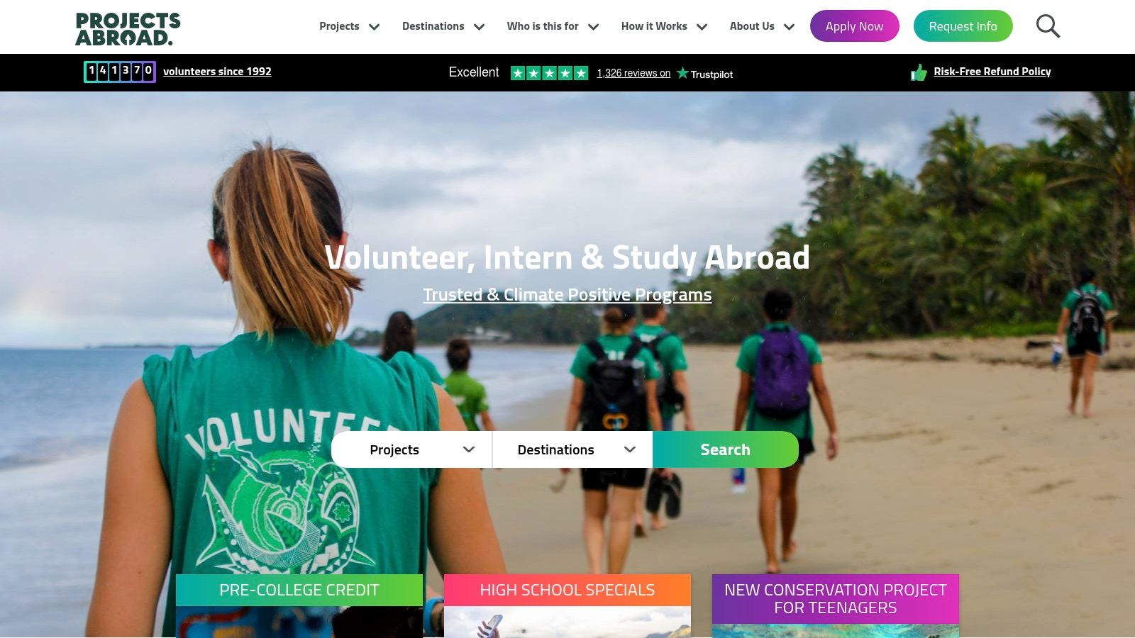 A volunteer teaching children in a classroom abroad.