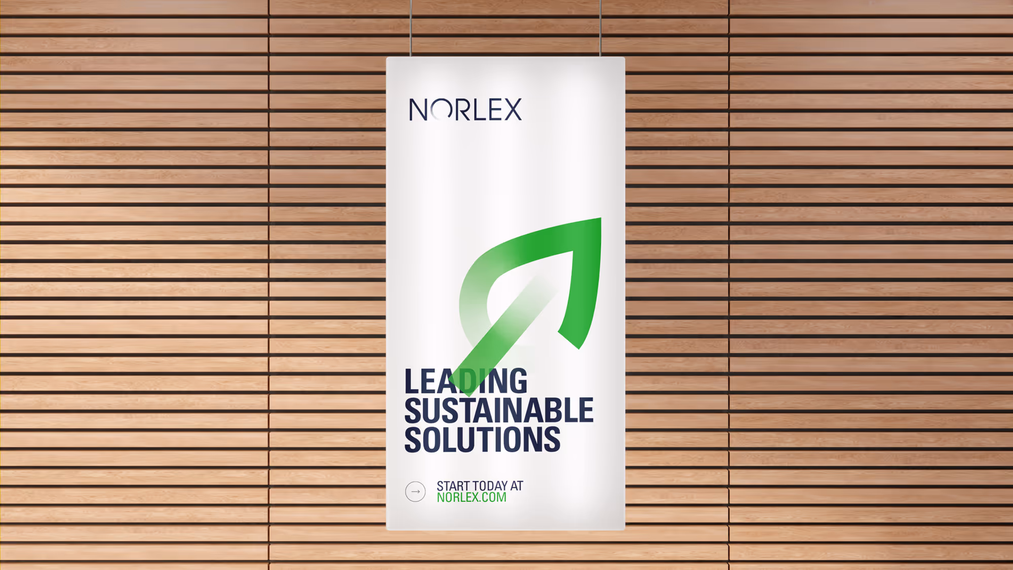 Hanging lightbox sign with NORLEX logo, green leaf graphic, and text: Leading Sustainable Solutions and start today at norlex.com.