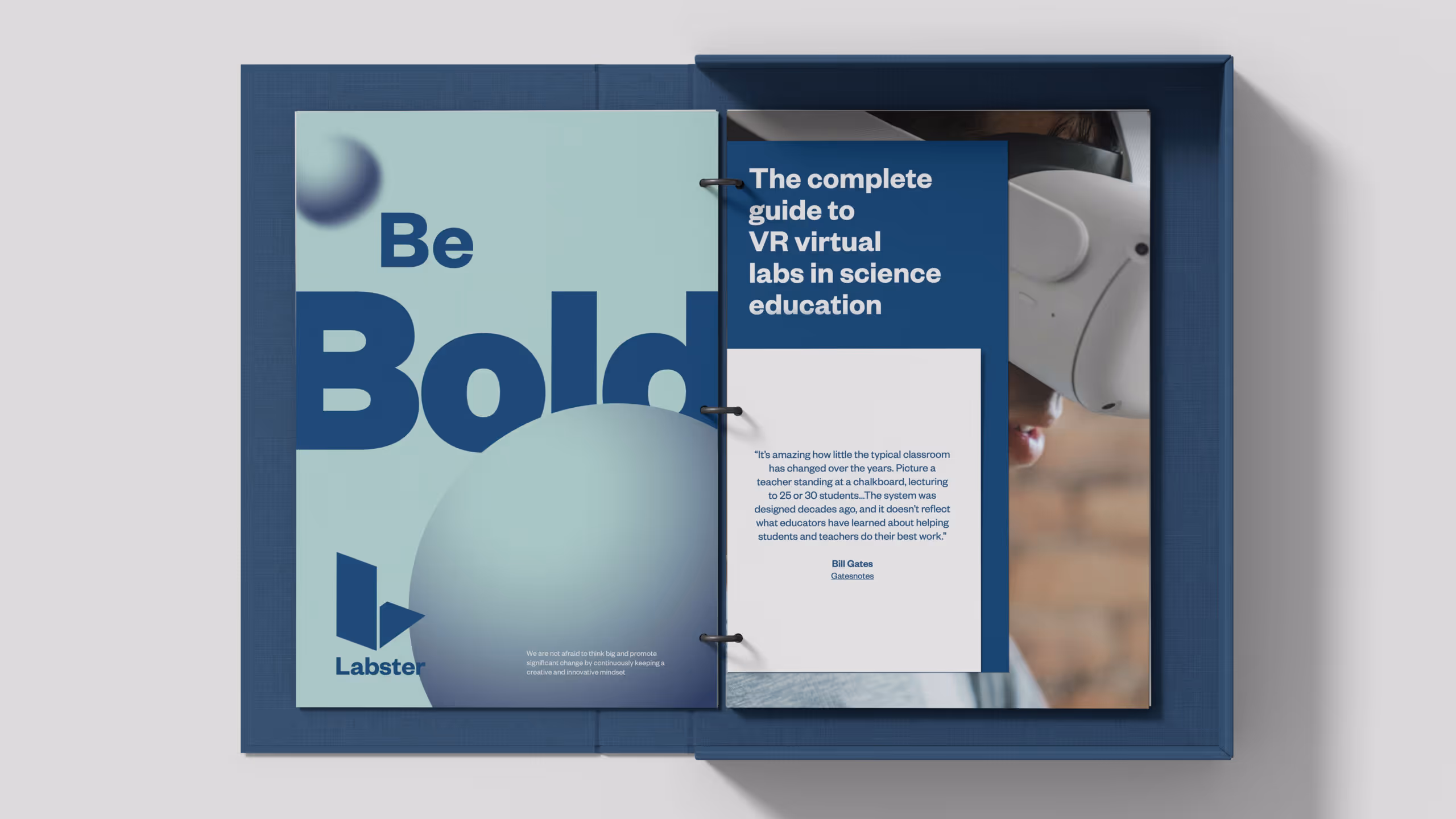 Open book titled 'Be Bold' from Labster, featuring a guide to VR virtual labs in science education and a Bill Gates quote about changes in teaching.