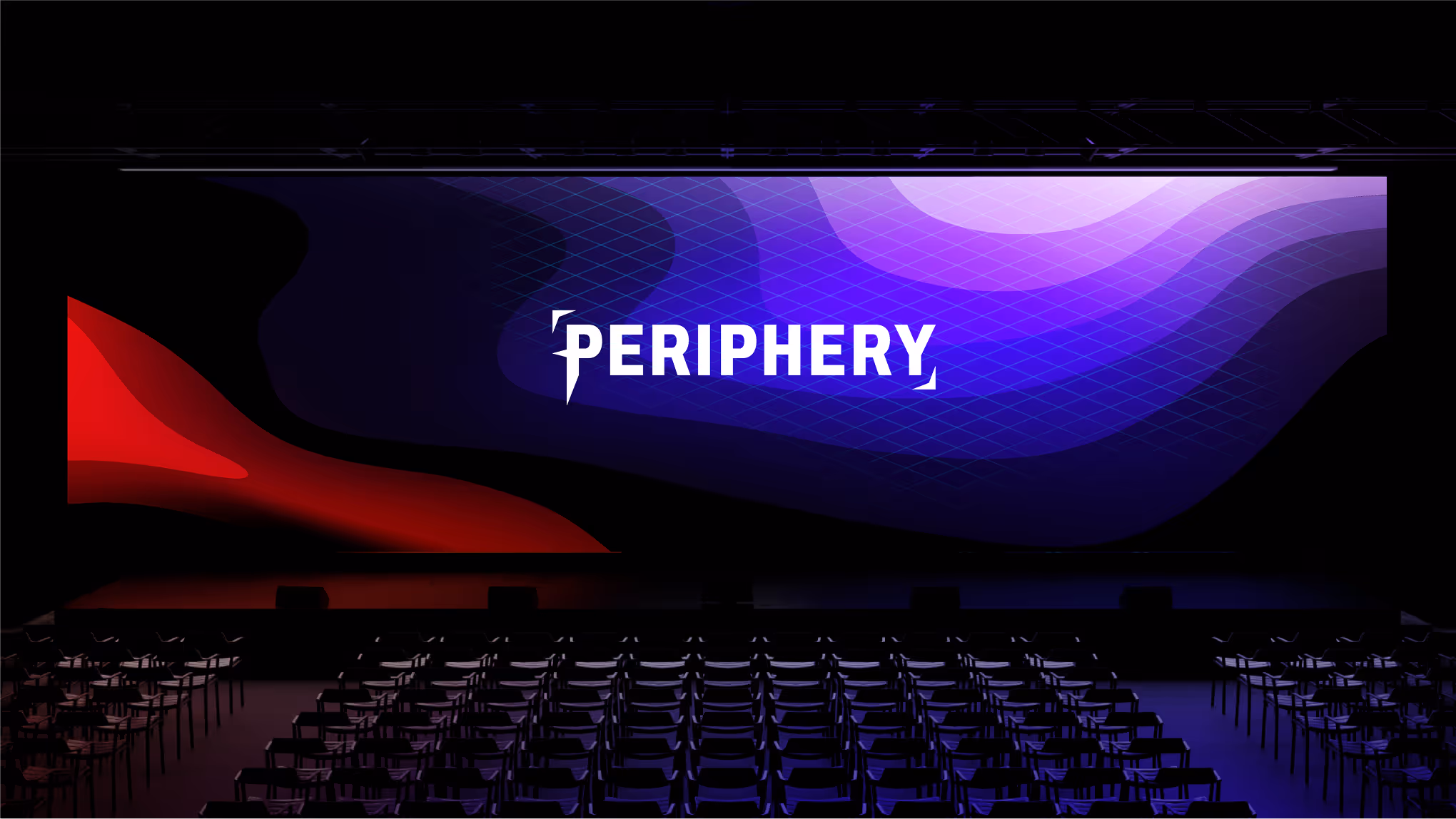 Empty auditorium with a stage featuring a large screen displaying 'PERIPHERY' in white text over abstract red and purple wave patterns.