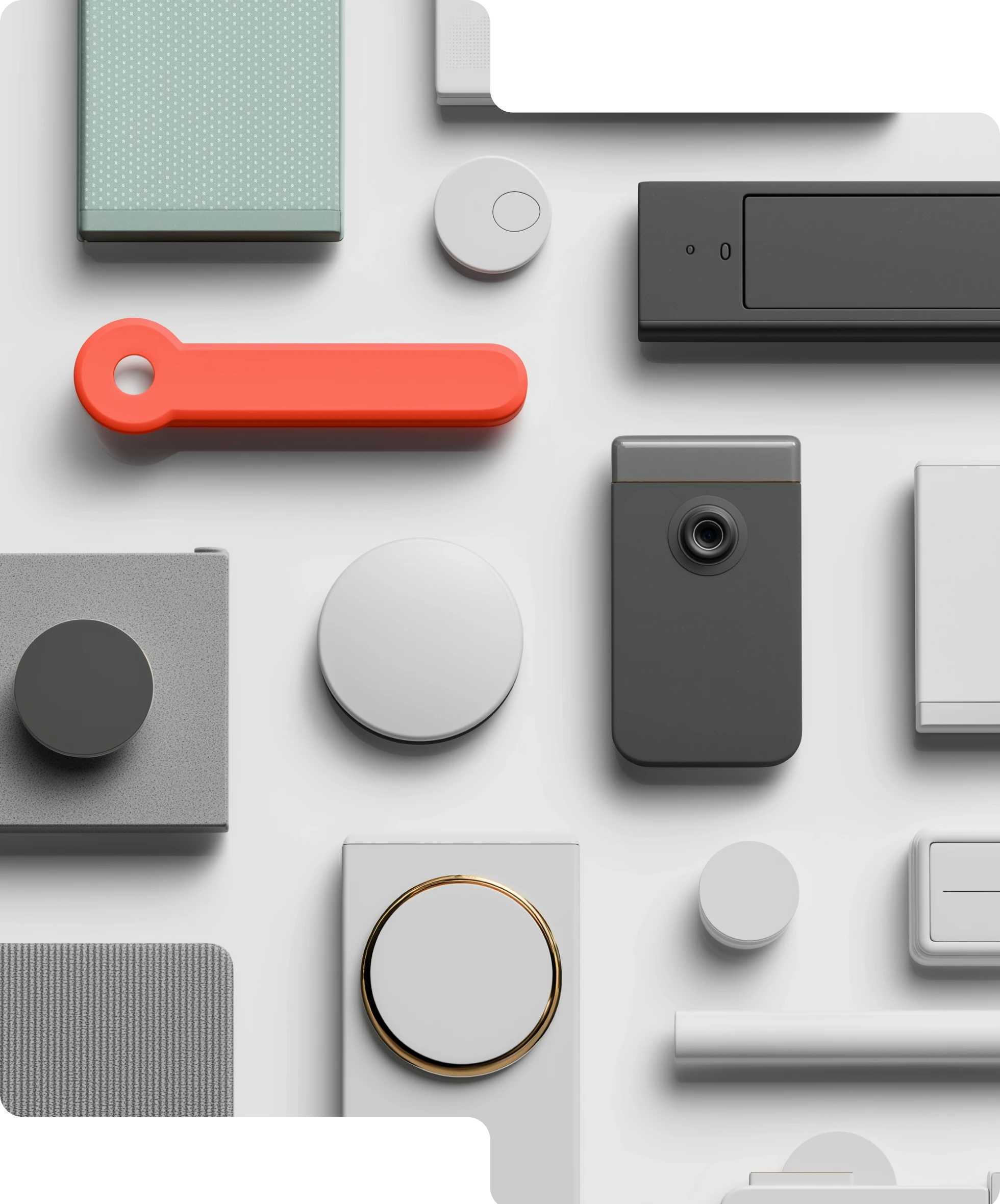 Flat lay of various modern electronic devices and controls including a camera, circular buttons, a slider, and a distinctive red toggle switch on a white background.