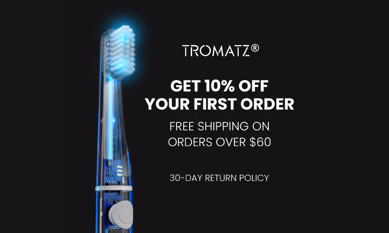 Social ad including a transparent electric toothbrush glowing blue with text offering 10% off first order, free shipping over $60, and 30-day return policy.