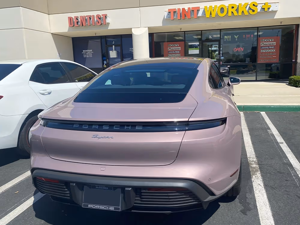 Pink Porsche Taycan after exterior customization and styling upgrades by our vehicle upgrade shop.