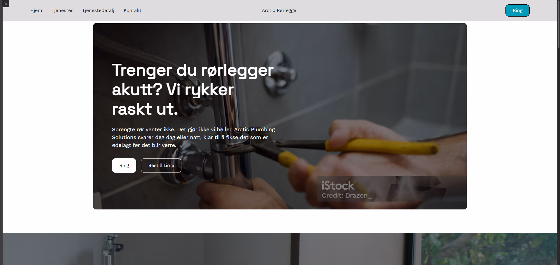 Close-up of hands using yellow-handled pliers to repair a chrome plumbing pipe in a bathroom.