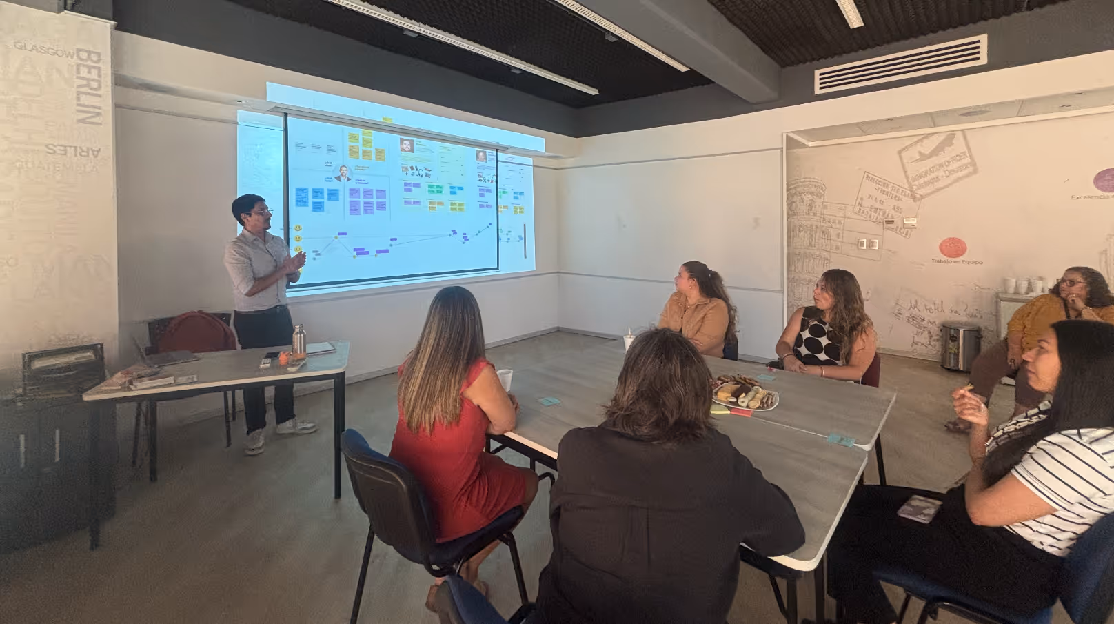 Chris talking in a activity with travel agents