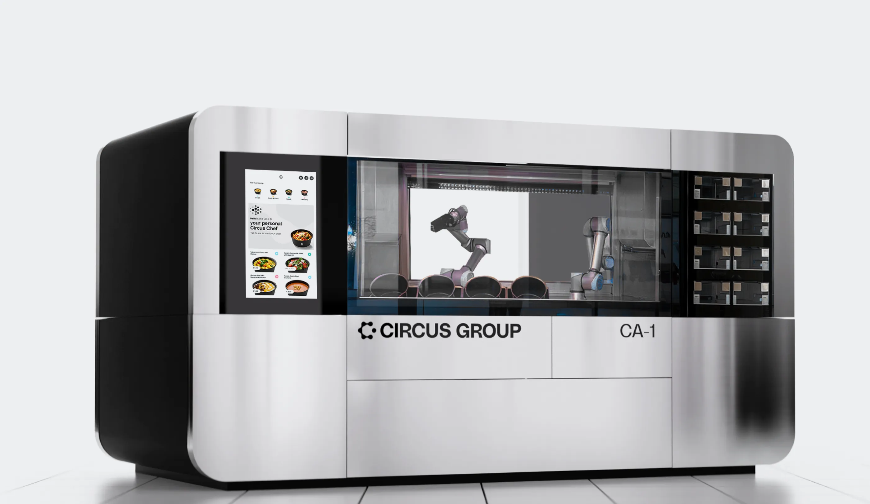 A sleek automated kitchen machine labeled 'Circus Group CA-1' with robotic arms visible inside and a touchscreen menu displaying food options on the left side.