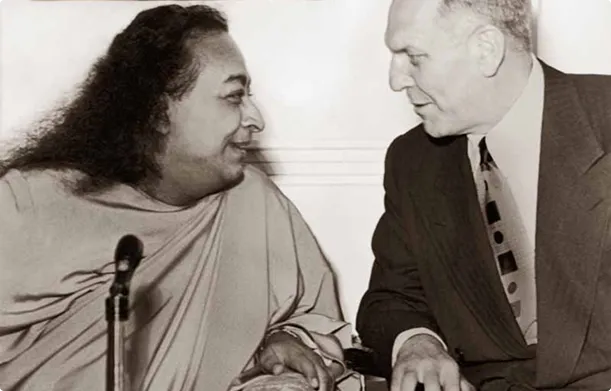 Paramahansa Yogananda, conversing with Goodwin J. Knight, then the Lieutenant Governor of California, at the 1951 dedication of India Hall.