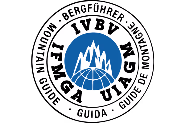 Partner logo of International Federation of Mountain Guides Associations representing Alpine Guides’ alignment with international guiding standards and best practice.