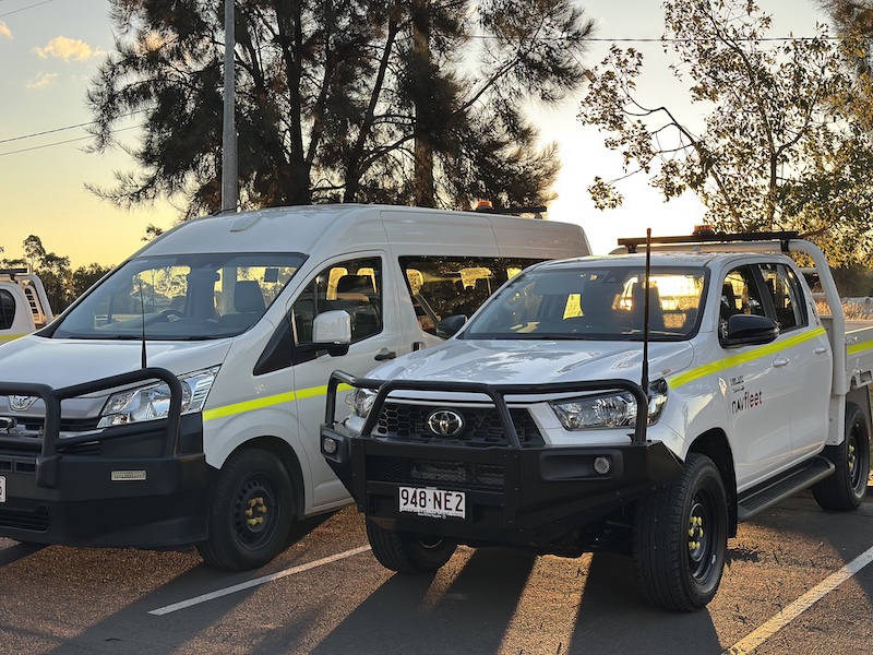 Industrial fleet vehicles parked outdoors
