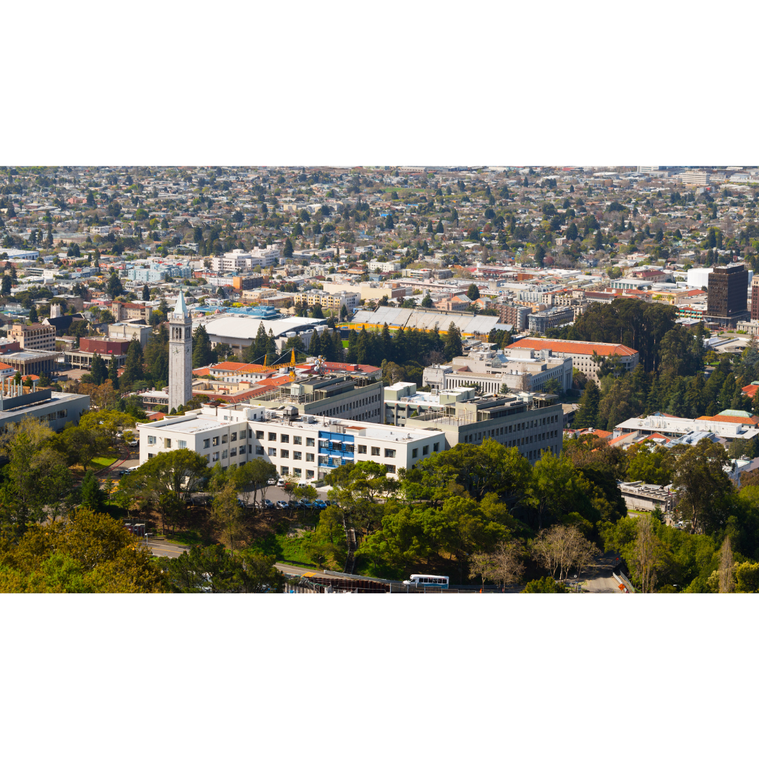 An aerial view of the UC Berkeley campus including buildings and trees.