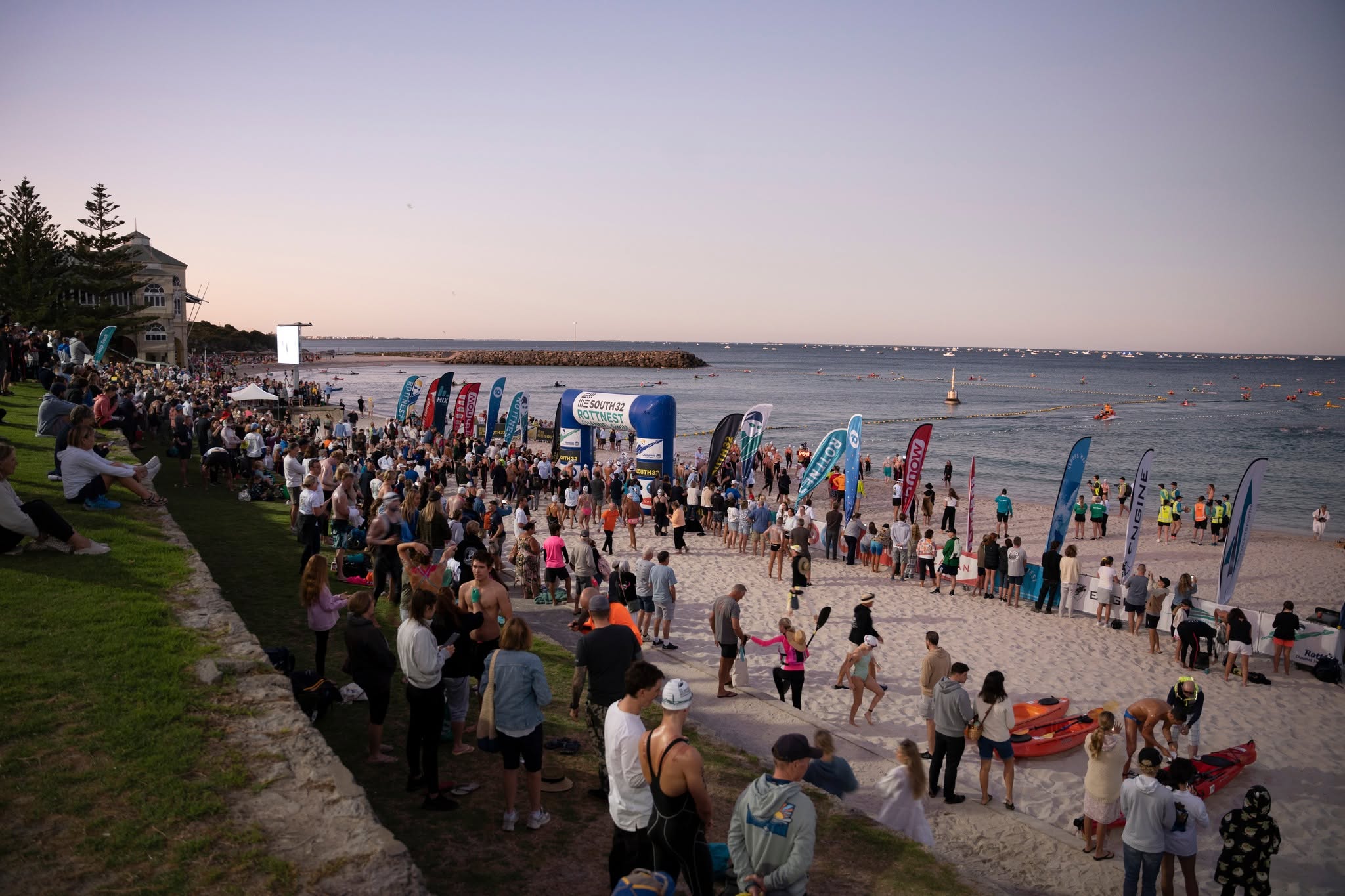 Swimmers and support crews gathered on Leighton Beach at dawn