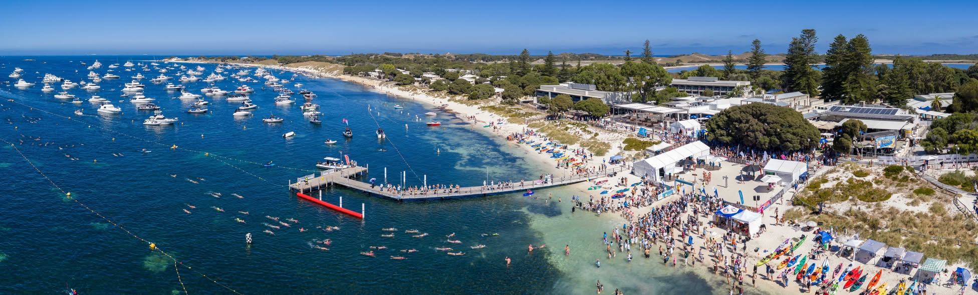 Aerial of swimmers and paddlers on Leighton Beach
