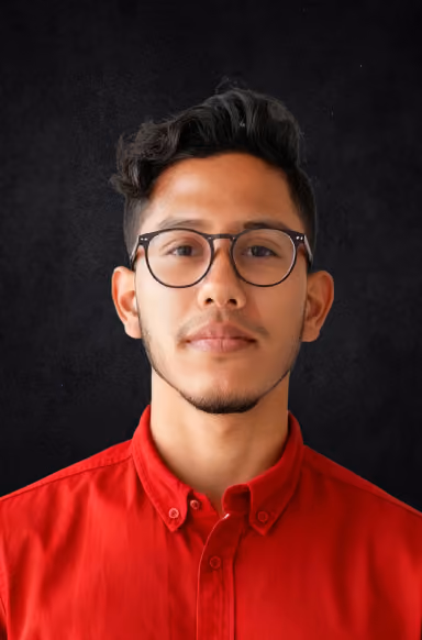 Person with glasses in red shirt