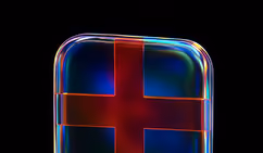 Close-up of a transparent cube with a glowing red cross inside against a black background.