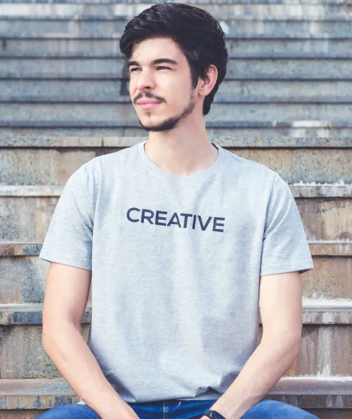 a man sitting on steps with his hands in his pockets - volunteer - best organization website webflow CMS template