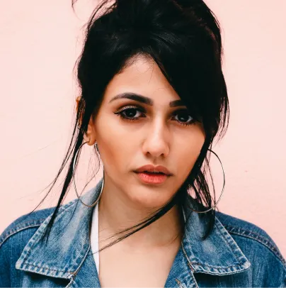 a close up of a person wearing a jean jacket - volunteer - best organization website webflow CMS template