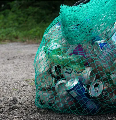 a bag full of soda cans sitting on the ground - volunteer - best organization website webflow CMS template