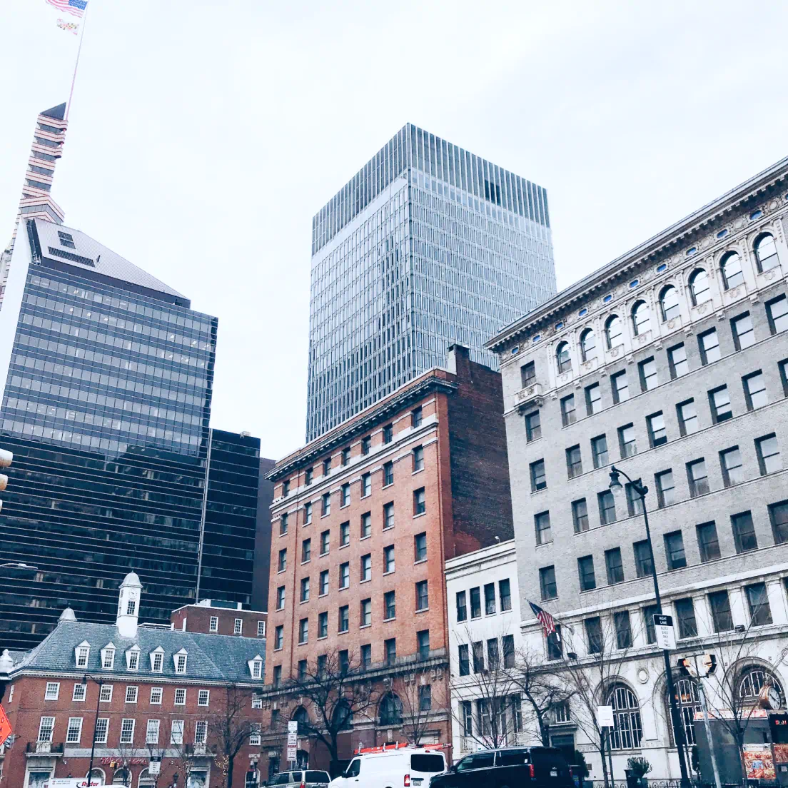 a city street filled with lots of tall buildings - volunteer - best organization website webflow CMS template