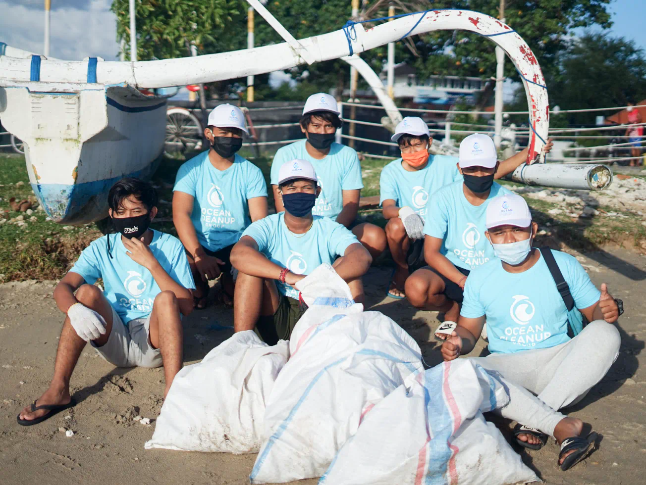 a group of people in blue shirts and white hats - volunteer - best organization website webflow CMS template