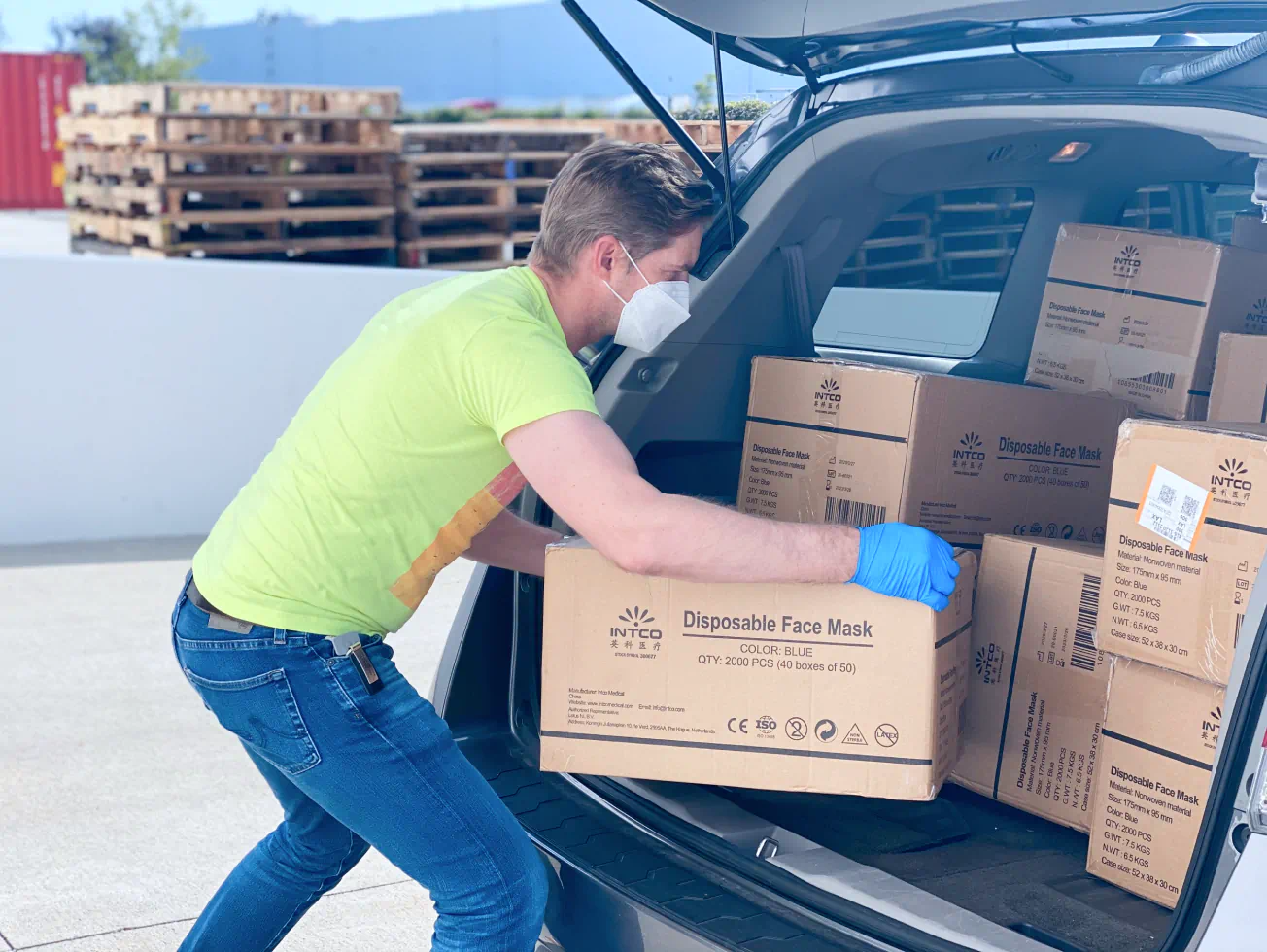 a man unloading boxes from the back of a car - volunteer - best organization website webflow CMS template
