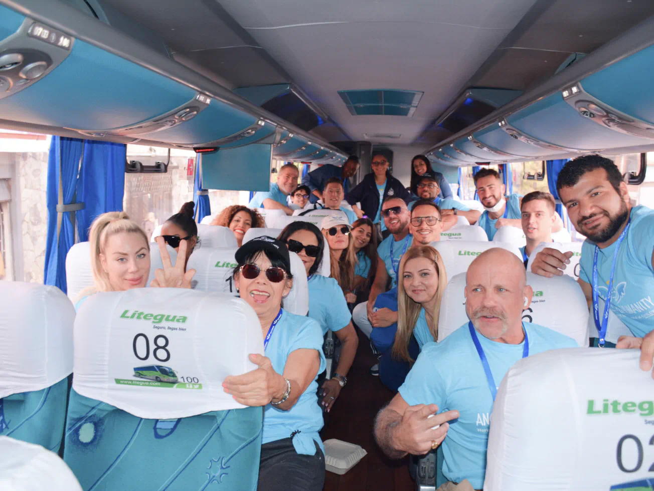 a group of people on a bus holding up signs - volunteer - best organization website webflow CMS template