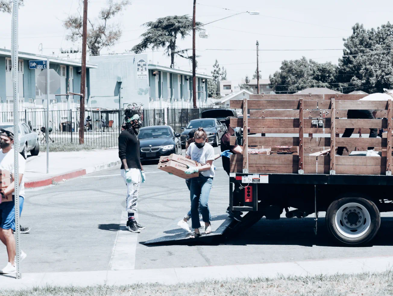a group of people standing next to a truck - volunteer - best organization website webflow CMS template