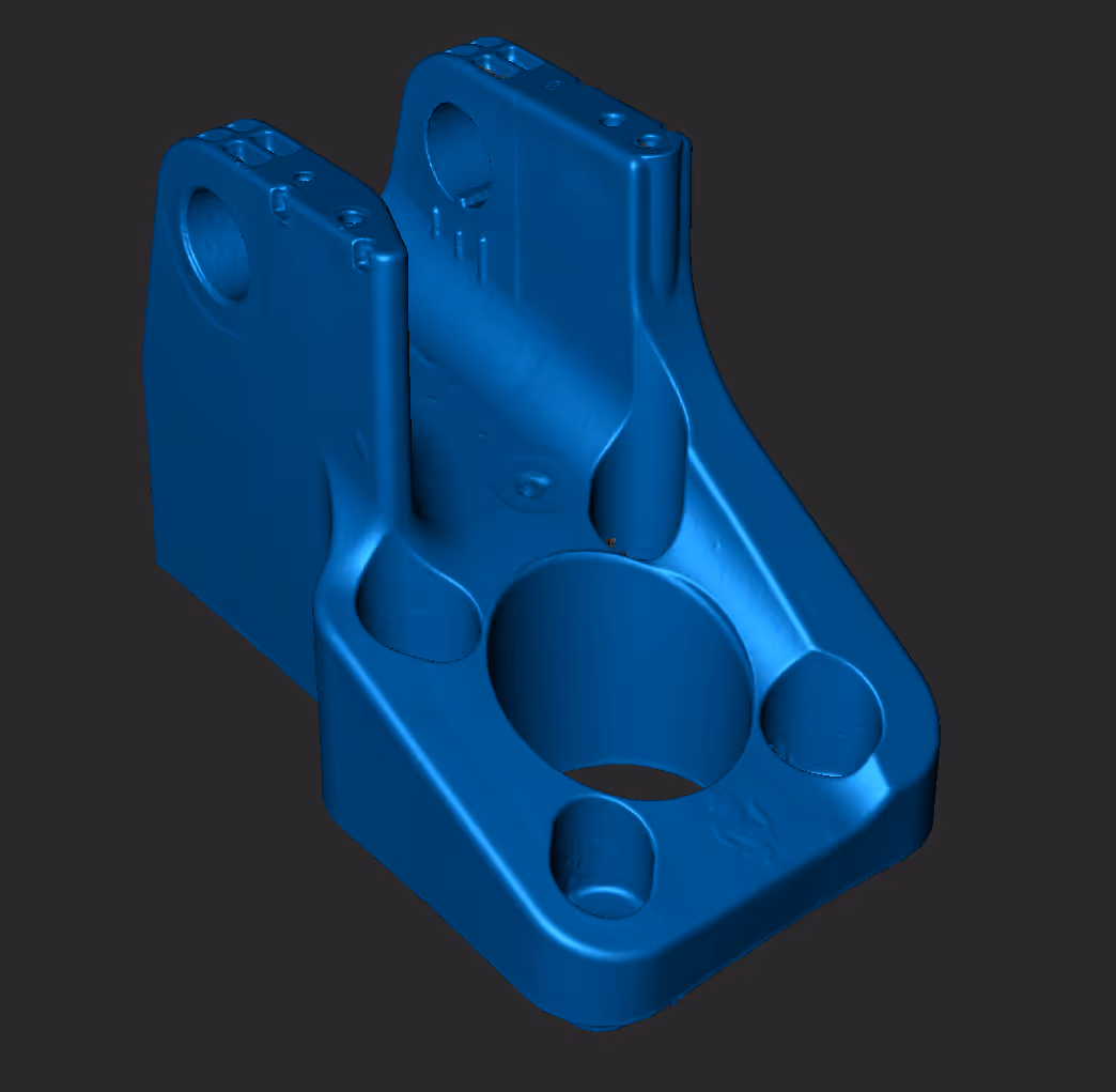 Blue 3D model of a mechanical bracket with multiple circular holes on a dark gray background.