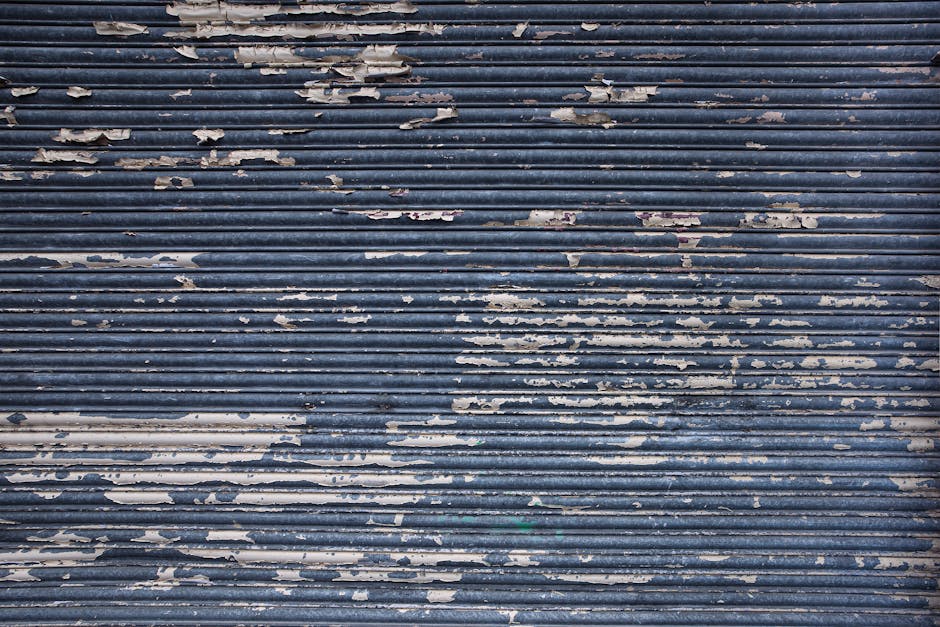 visibly worn or damaged garage door - Best Garage Door Installation in Bee Cave, TX