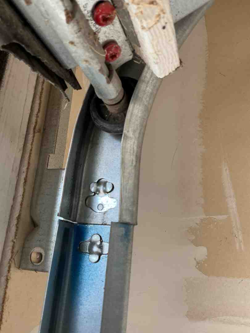 Infographic showing three main causes of off-track garage doors: Impact Damage (vehicle collision or object striking door), Worn Components (deteriorated rollers, frayed cables, loose hardware), and Track Problems (bent metal from weight, misalignment from foundation shifts, obstructions blocking path) - Why Is My Garage Door Off Track In Pflugerville TX