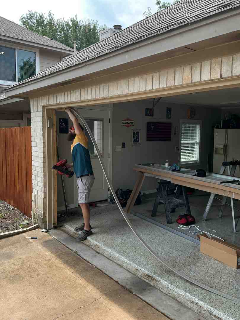 Technician installing an energy-efficient exterior door with proper weatherstripping - energy efficient home improvement tax Technician installing an energy-efficient exterior door with proper weatherstripping - energy efficient home improvement tax