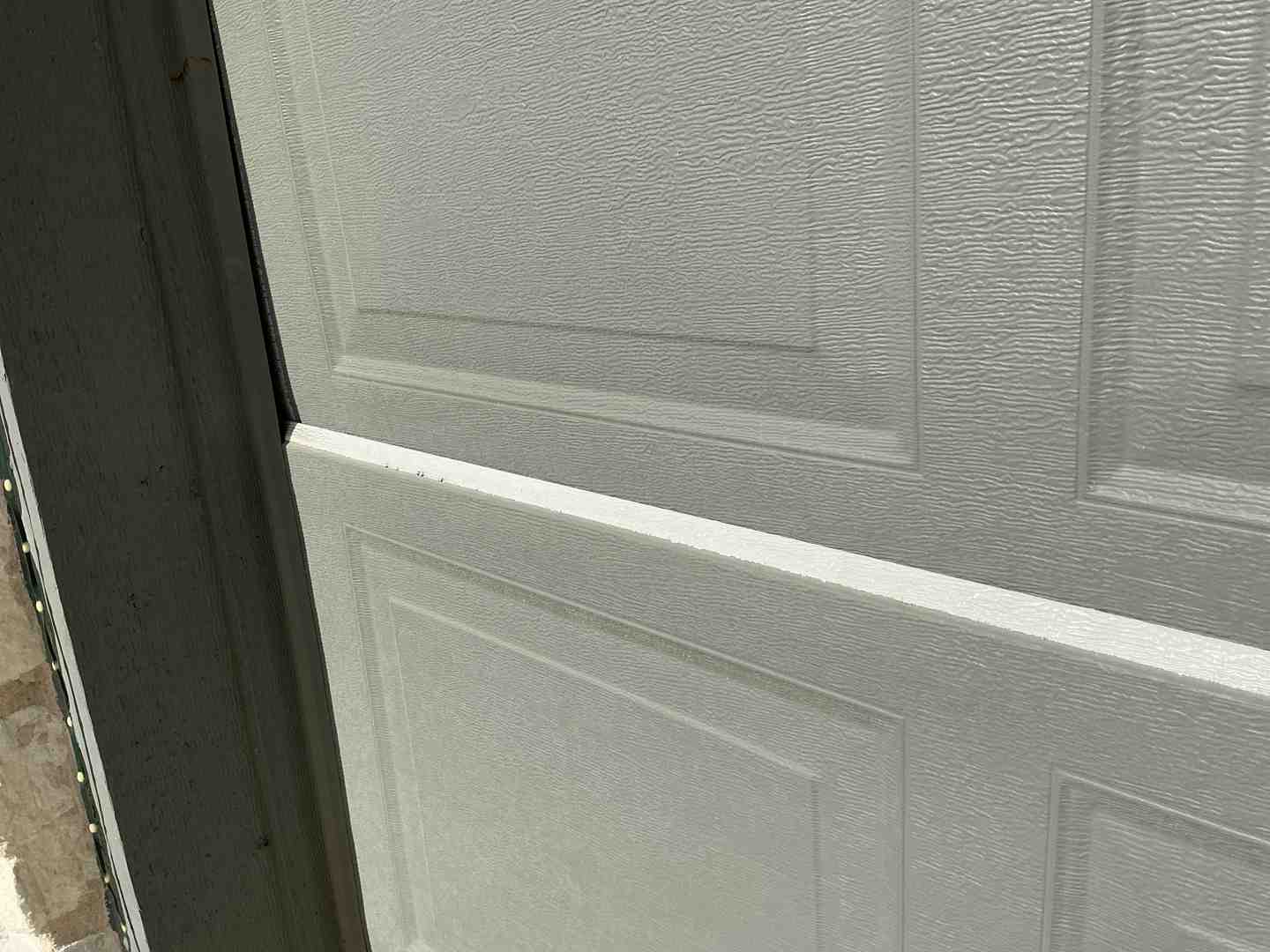 garage door material samples on a workbench