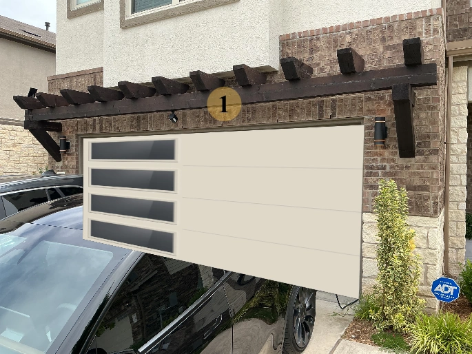 A beautiful newly installed insulated garage door on a modern home in Pflugerville TX A beautiful newly installed insulated garage door on a modern home in Pflugerville TX