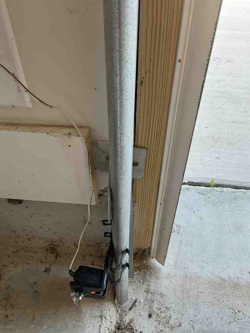 pre-1993 garage door opener lacking safety sensors near the floor