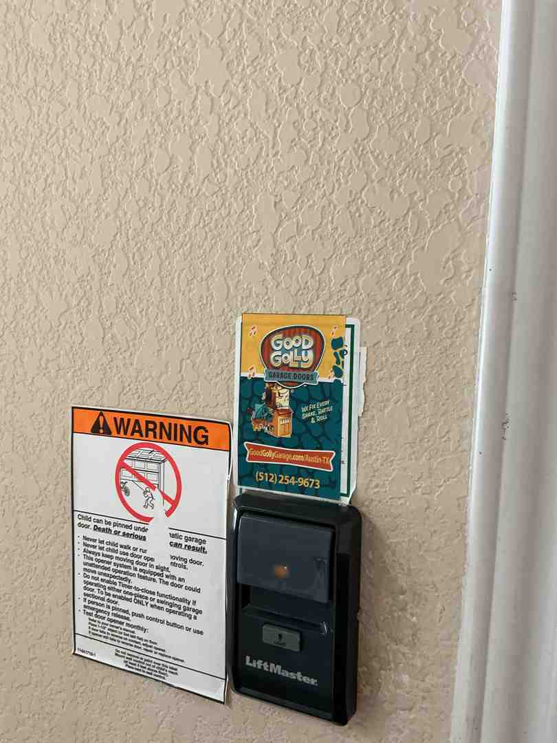 child safe garage wall button mounted five feet high