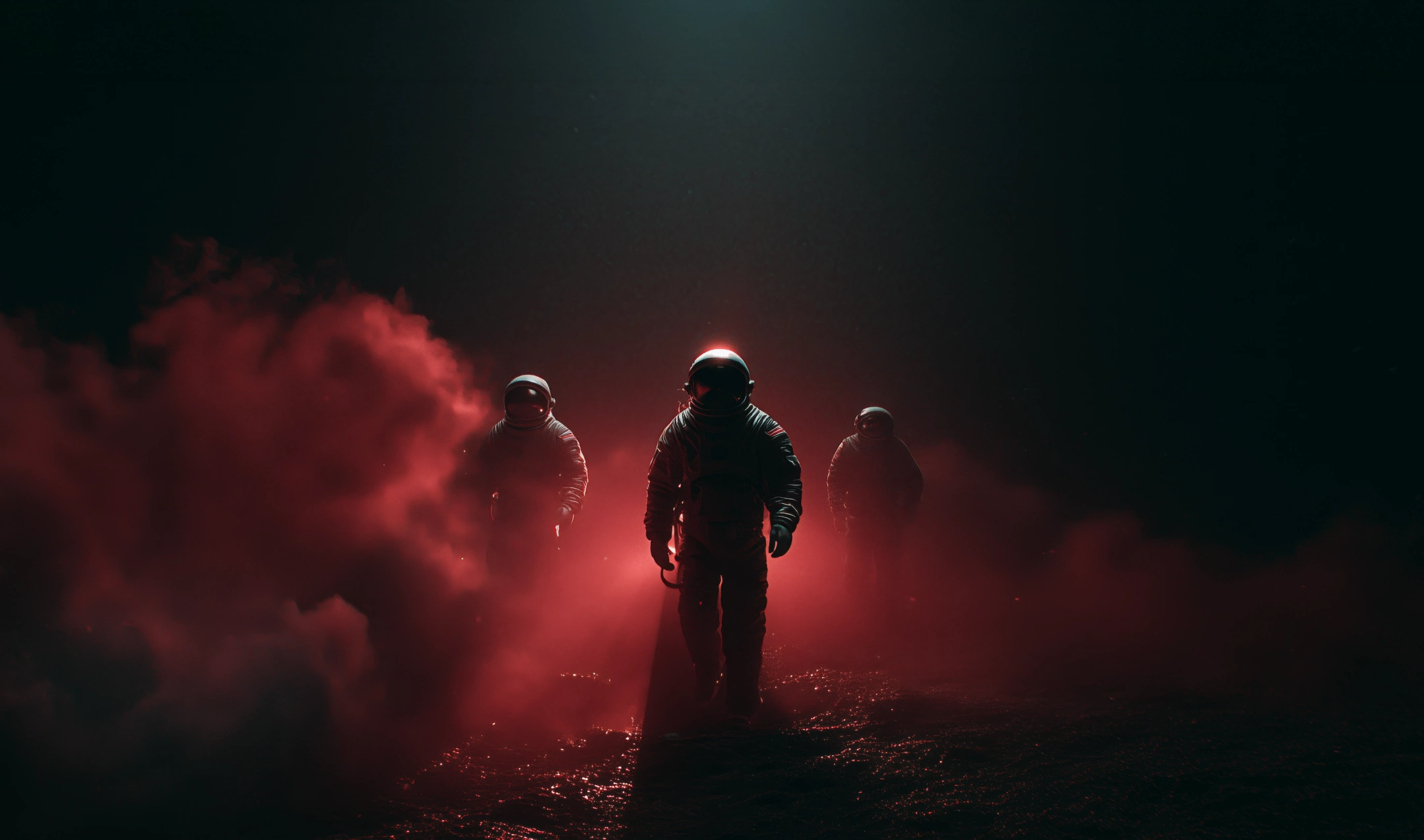 Three astronauts walking through a dark environment filled with red smoke and illuminated by red light.