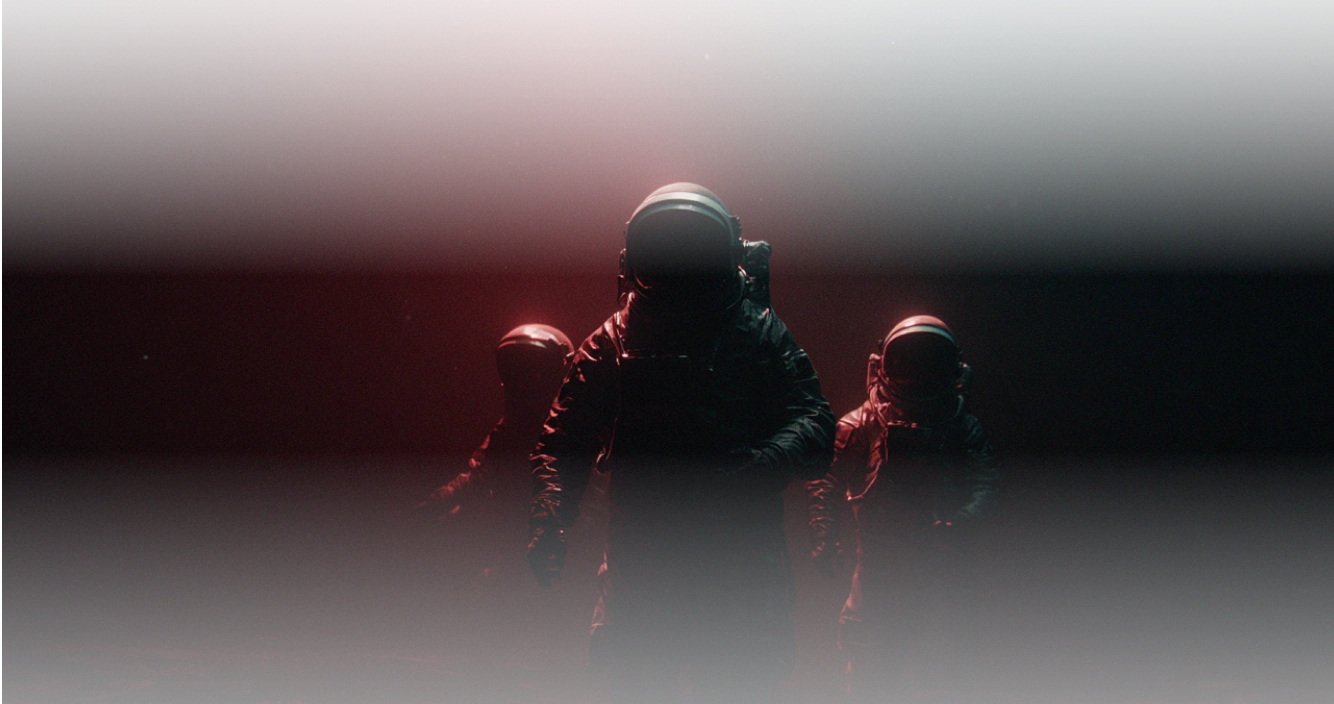 Three astronauts in spacesuits illuminated by red light in a dark, foggy environment.
