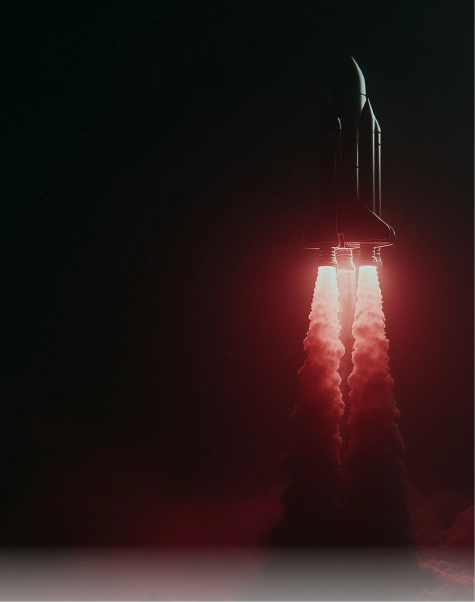 Space shuttle launching with bright rocket flames and thick smoke trailing behind it against a dark sky.